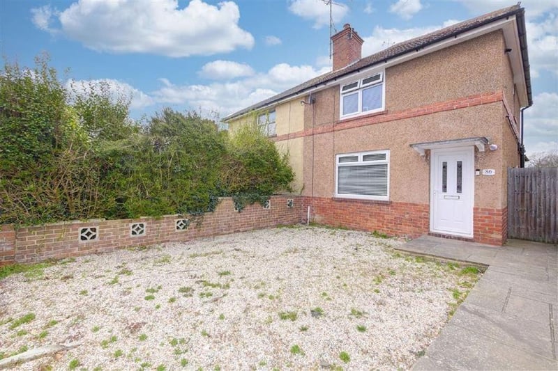 A two bed semi-detached house. Price: £250,000.