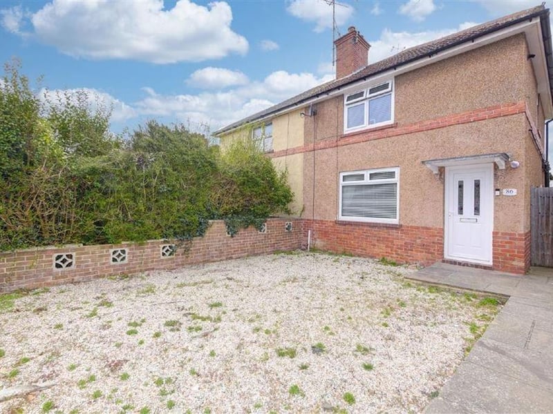 A two bed semi-detached house. Price: £250,000.