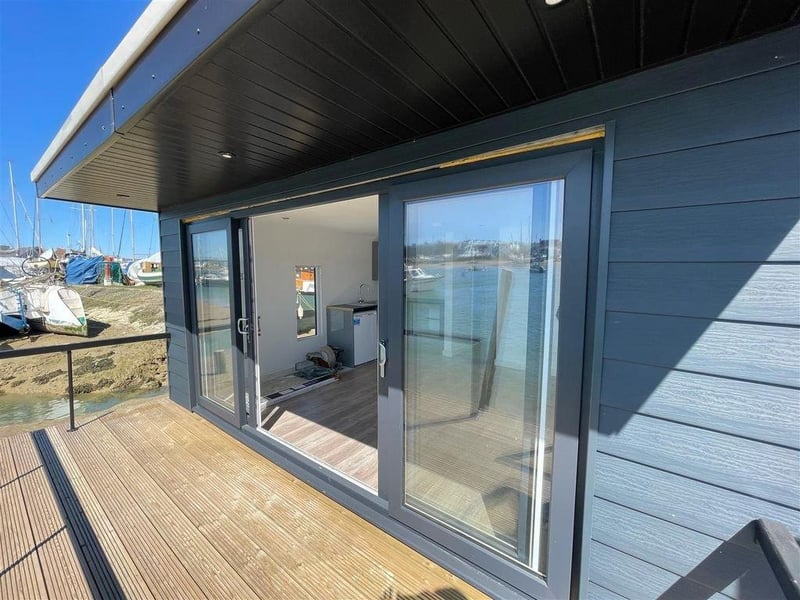 A new two bedroom houseboat. Price: £165,00.