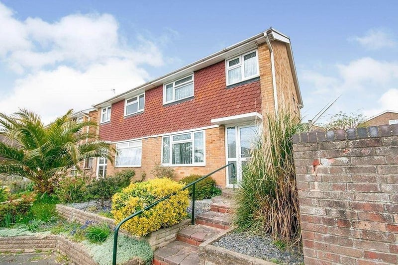 A three bed semi-detached house. Price: £270,000.