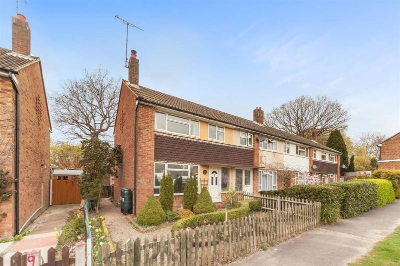 A large two bed end-of-terrace house. Price: £300,000.