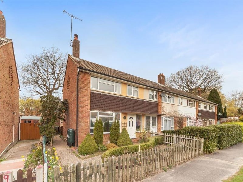 A large two bed end-of-terrace house. Price: £300,000.