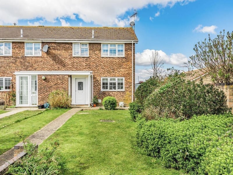 A three bed end-of-terrace house. Price: £260,000.