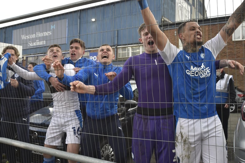 Posh players can't contain their excitement. Photo: David Lowndes