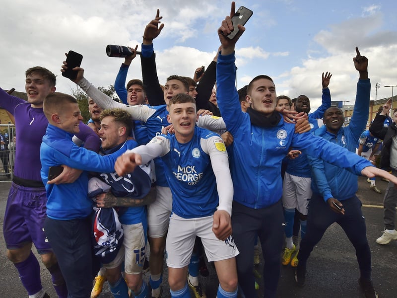 Posh drew with Lincoln City to gain promotion to the Championship triggering huge celebrations with fans outside the Weston Homes Stadium. Pictures: David Lowndes