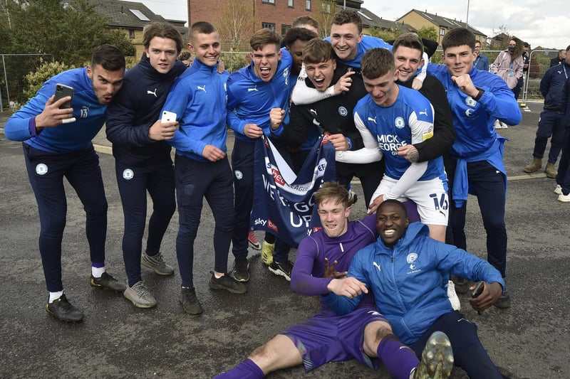 Senior and junior Posh players join in the celebrations. Photo: David Lowndes.
