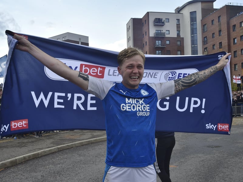 Posh drew with Lincoln City to gain promotion to the Championship triggering huge celebrations with fans outside the Weston Homes Stadium. Pictures: David Lowndes
