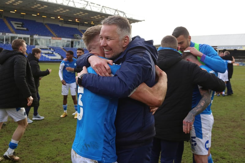 Delighted Posh boss Darren Ferguson gives Dan Butler, who put in an heroic performance, a hug. Photo: Joe Dent/JMP