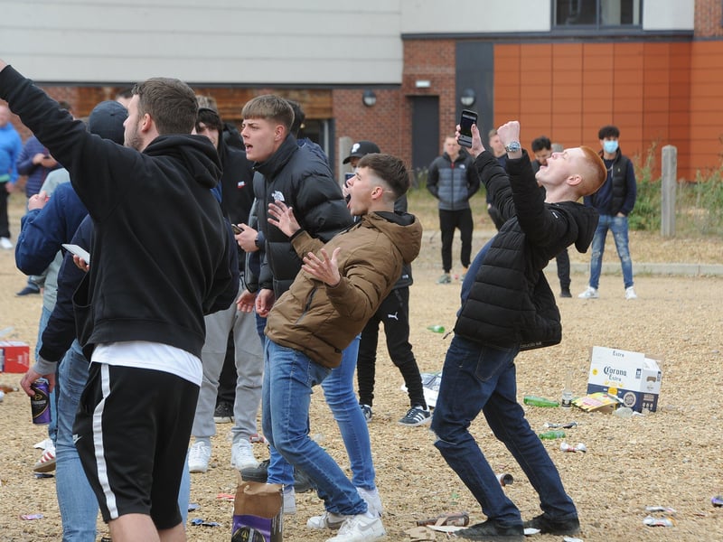 Posh drew with Lincoln City to gain promotion to the Championship triggering huge celebrations with fans outside the Weston Homes Stadium. Pictures: David Lowndes