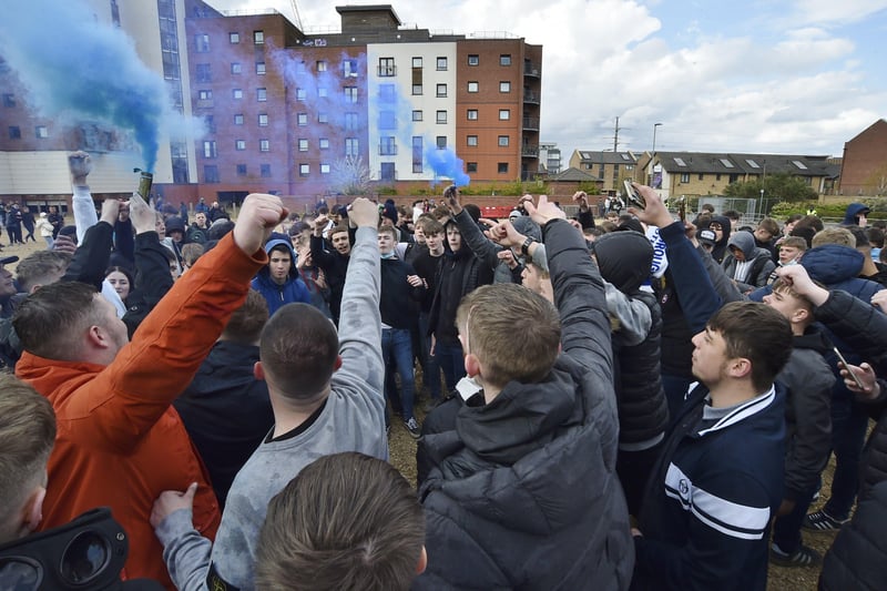 Posh drew with Lincoln City to gain promotion to the Championship triggering huge celebrations with fans outside the Weston Homes Stadium. Pictures: David Lowndes