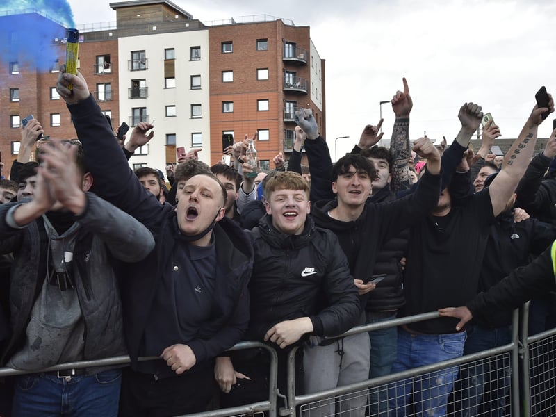 Posh drew with Lincoln City to gain promotion to the Championship triggering huge celebrations with fans outside the Weston Homes Stadium. Pictures: David Lowndes