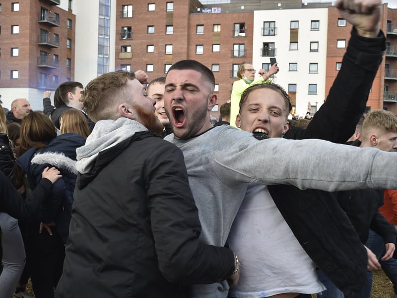 Posh drew with Lincoln City to gain promotion to the Championship triggering huge celebrations with fans outside the Weston Homes Stadium. Pictures: David Lowndes