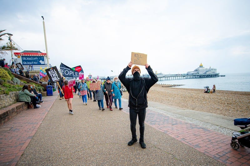 Protesters march along Eastbourne seafront as residents voiced their concern over the Bill. SUS-210405-153301001