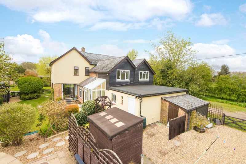 Access on either side of the property leads to the garage and rear garden which is principally lawned with well stocked borders, gravelled areas, and a paved terrace.