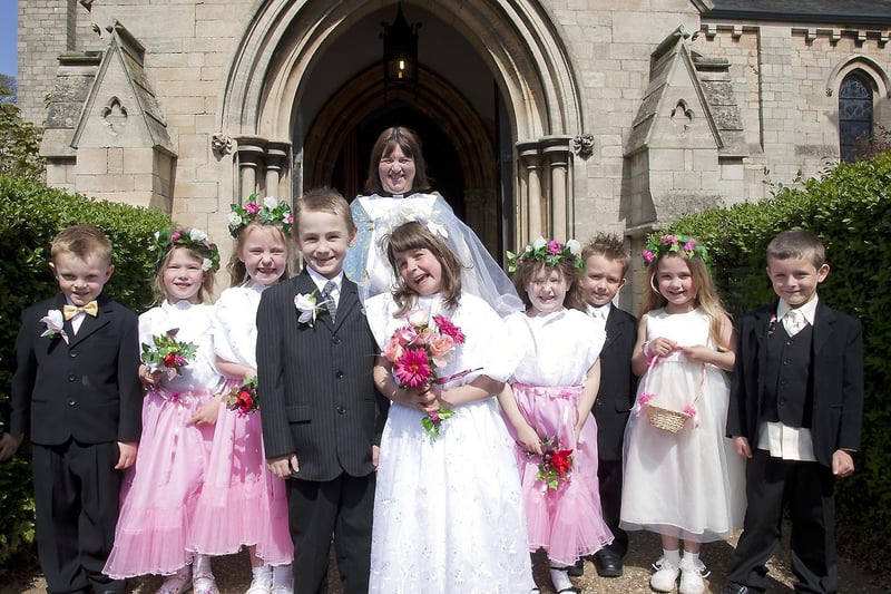 Youngsters at the Richmond School, Skegness, during a
mock-wedding ceremony at St Matthew’s Church, conducted by the Rev Julie Donn. The children were picked up by limousine for the occasion.
