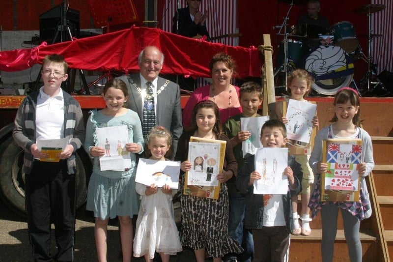 As part of Spilsby's May Day celebrations, Mayor David Pleming and chairman of Spilsby Business Partnership Angela Morgan-Knight presented prizes to local schoolchildren after a painting competition to mark the Royal Wedding.