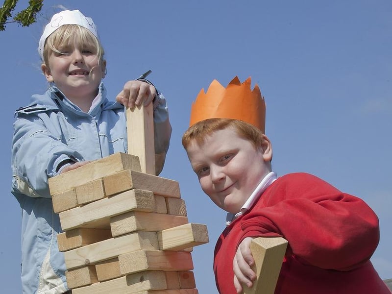 Summer Pocklington, eight, and Joseph Burns, nine, at a
royal wedding party held by Skegness Junior School.