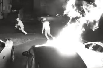 Police are keeping an "open mind" over whether two arson attacks in a Northamptonshire village three weeks apart are connected.

This newspaper shared shocking video of two yobs torching three cars on a driveway in Weedon Bec in the early hours of Wednesday, March 30, morning.

That followed a similar attack on a vehicle parked outside a house about half-a-mile away earlier this month.