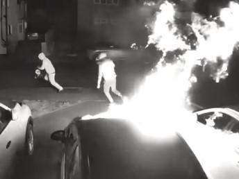 Police are keeping an "open mind" over whether two arson attacks in a Northamptonshire village three weeks apart are connected.
This newspaper shared shocking video of two yobs torching three cars on a driveway in Weedon Bec in the early hours of Wednesday, March 30, morning.
That followed a similar attack on a vehicle parked outside a house about half-a-mile away earlier this month.