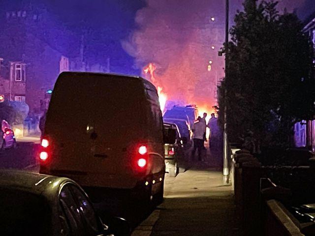 Police and fire fighters believe a van was abandoned and set alight in Northampton.
Fire crews were called to the incident in Balfour Road, Queens Park, on Saturday, April 24, at around 11pm where they found a white Ford Transit van's door open, windows smashed and on fire.
It is being treated as arson.