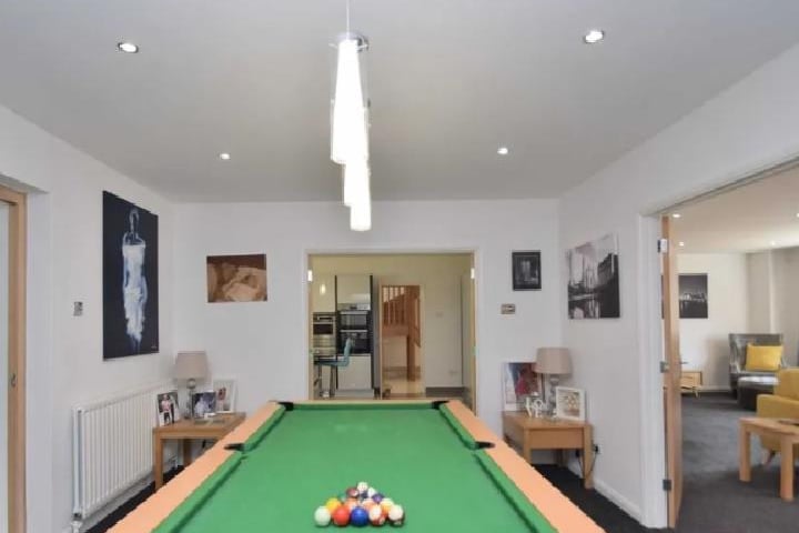 There's plenty of space in this reception room for an oversized pool table.