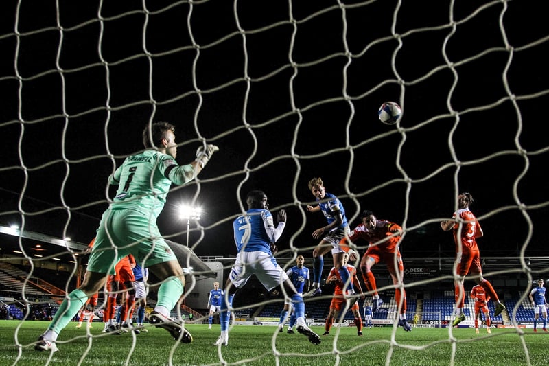 Frankie Kent’s headed goal against Blackpool at the Weston Homes Stadium is caught by a  camera in the goal net.