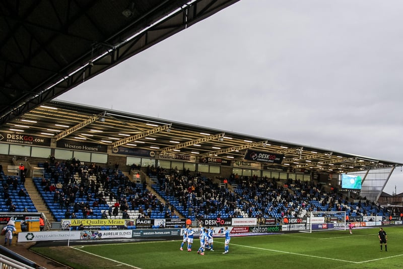 Posh supporters watch on (for the only time in League One all season) as Jonson Clarke-Harris scores the opening goal of the game against Rochdale.