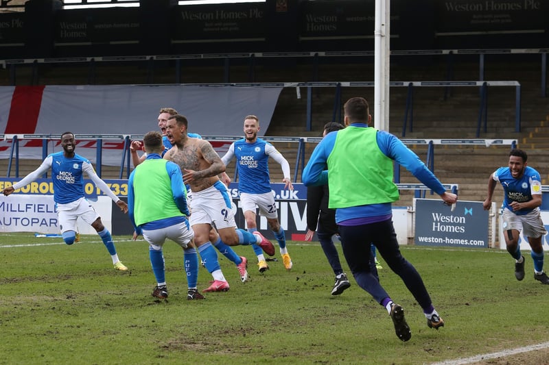 2020-21: Posh deliver one of the greatest seasons in the club history. Not even the absence of Toney and the club's passionate fans could stop Ferguson securing his fourth Posh promotion and a third to the Championship. And what a finish as Posh fought back from 3-0 down with 25 minutes to go against Lincoln City - the only team who could deny them automatic promotion -to draw 3-3 at the Weston Homes Stadium in the penultimate game of the season. Jonson Clarke-Harris is pictured celebrating with teammates after scoring the 96th minite equaliser from the penalty spot. League One finish: 2nd. Highlight: The Lincoln game. Lowlight: The absence of fans.