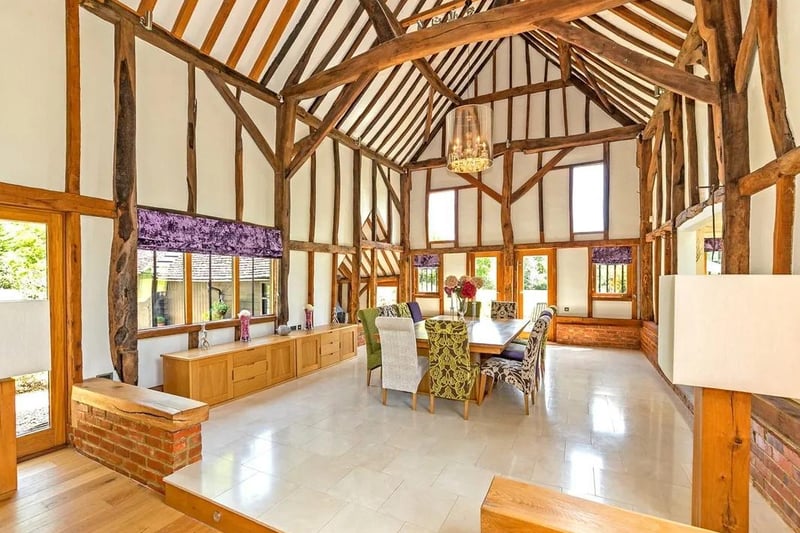 The vaulted barn offers spacious sitting area