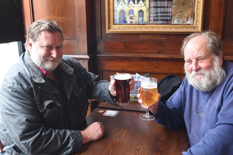 Mark Hifle and Kevin Shanks raise a glass at The Draper's Arms