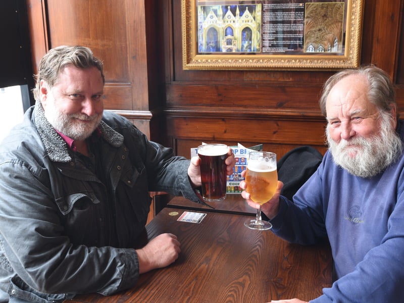 Mark Hifle and Kevin Shanks raise a glass at The Draper's Arms