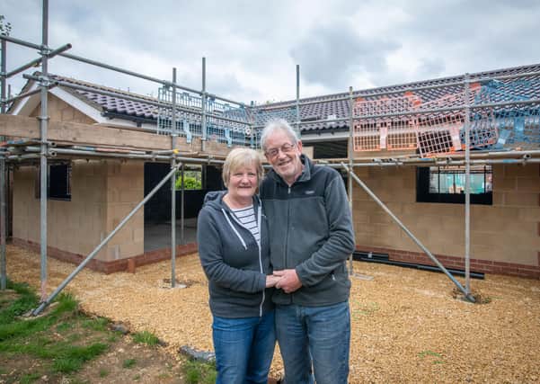Husband and wife Dave Turner and Olwyn Cornwell from Market Deeping in Lincolnshire suffered a major fire at their home. To help rebuild their bungalow, Forterra donated bricks and blocks. 
Copyright Mike Sewell 202114th May 2021 (Commissioned by Emily Mahon - Unsworth Sugden)
