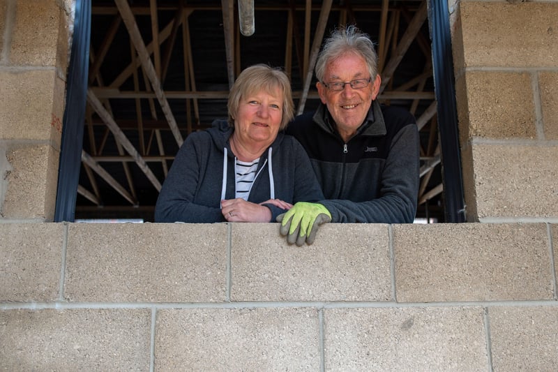 Husband and wife Dave Turner and Olwyn Cornwell admire work on their new home.
Copyright Mike Sewell 202114th May 2021 (Commissioned by Emily Mahon - Unsworth Sugden)