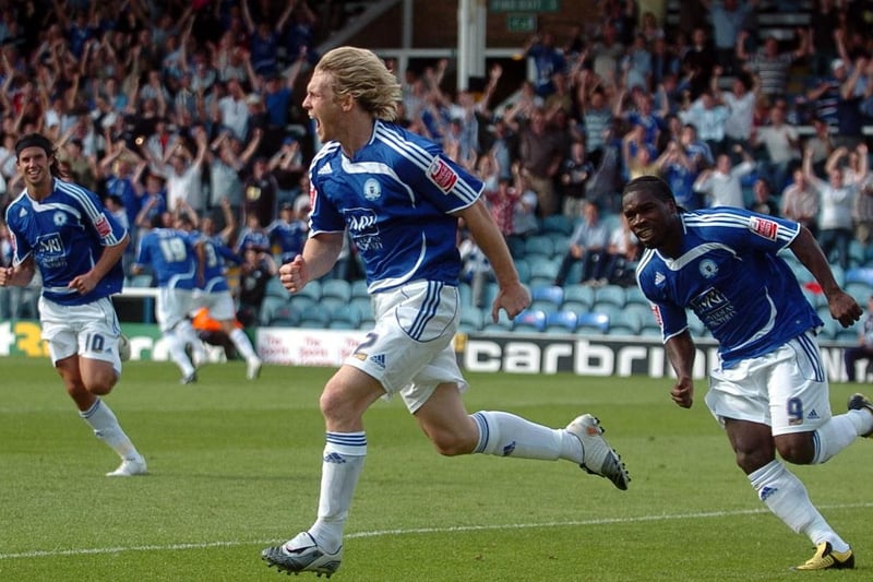 CENTRAL STRIKER: CRAIG MACKAIL-SMITH: 2008-09: 46 apps. 2010-11: 45 apps. Deciding to play just one out and out central striker caused a problem. Without question Aaron Mclean  (2008-09) and Jonson Clarke-Harris (2020-21) would be worthy selections. Smiling assassin Mclean was a deadly finisher and excellent in the air for someone who wasn’t that tall. Clarke-Harris racked up some incredible numbers last season, but he was also a selfless performer and nerveless in the biggest moments as he showed in the penultimate game of the season when so much was on the line. But how do you not select a player whose commitment, hard-running and goalscoring record were so strong throughout two League One promotion seasons? Craig Mackail-Smith scored 50 goals in those two seasons combined and missed just one game.