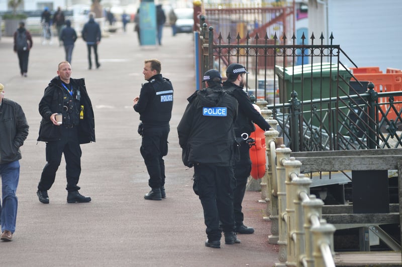 Police were seen on the seafront after the bags were spotted in the sea SUS-210524-122143001