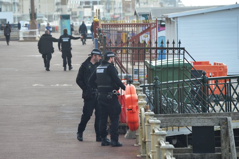 Police were seen on the seafront after the bags were spotted in the sea SUS-210524-122155001
