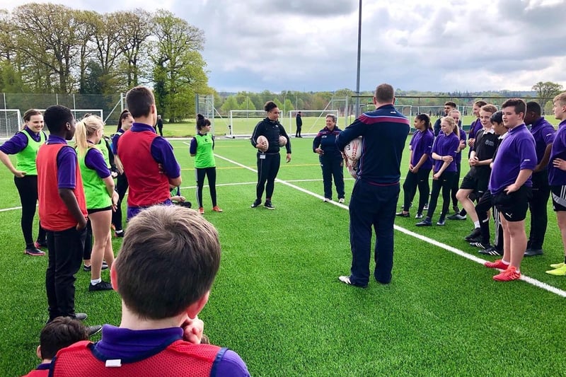 Shaunagh Brown with students on the new pitch