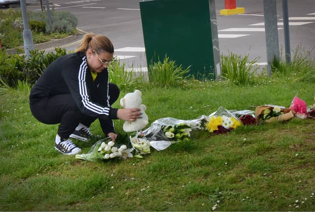 Floral tributes at Bexhill Academy May 25 2021. SUS-210525-123135001