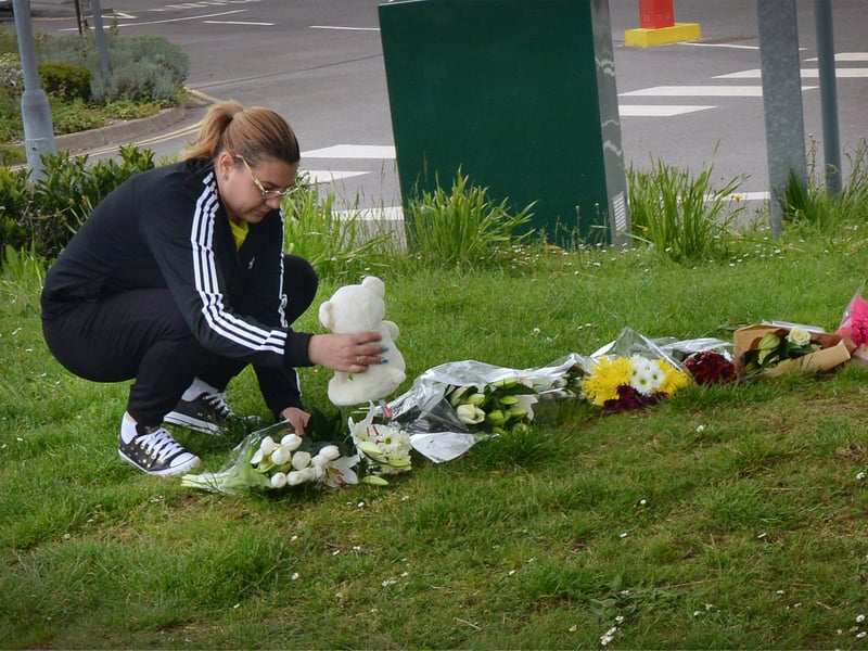 Floral tributes at Bexhill Academy May 25 2021. SUS-210525-123135001