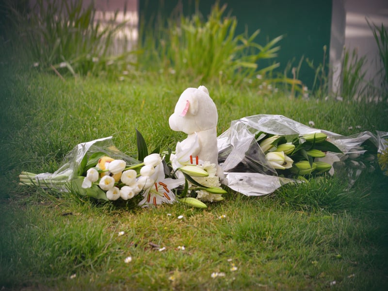 Floral tributes at Bexhill Academy May 25 2021. SUS-210525-123200001