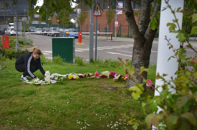 Floral tributes at Bexhill Academy May 25 2021. SUS-210525-123147001