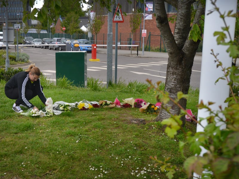 Floral tributes at Bexhill Academy May 25 2021. SUS-210525-123147001
