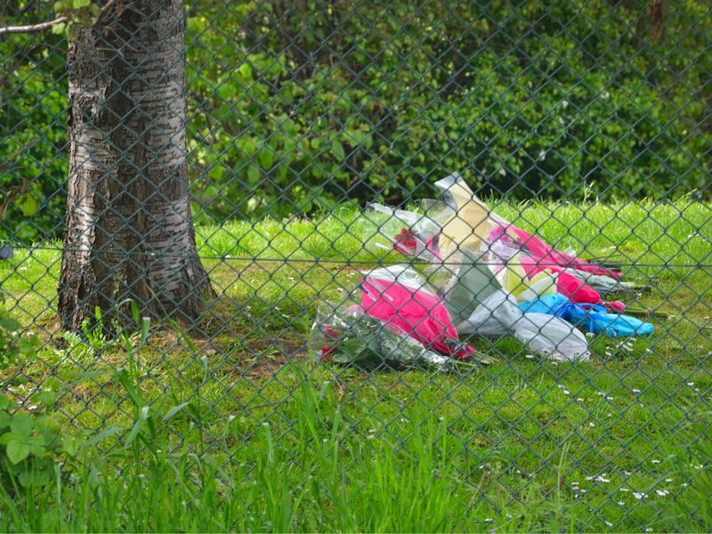 Floral tributes at Bexhill Academy May 25 2021. SUS-210525-123456001