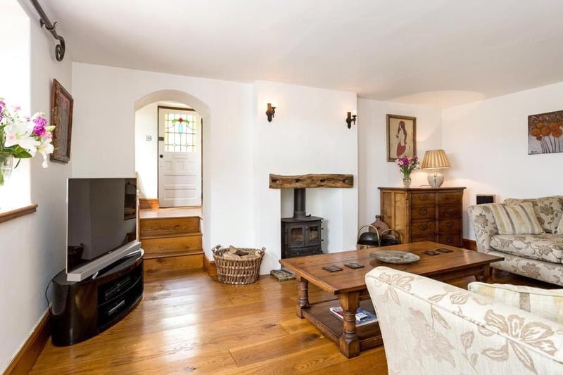 Sitting room at the former post office and coach house turned home in the village of Ratley near Banbury (Image from Rightmove)
