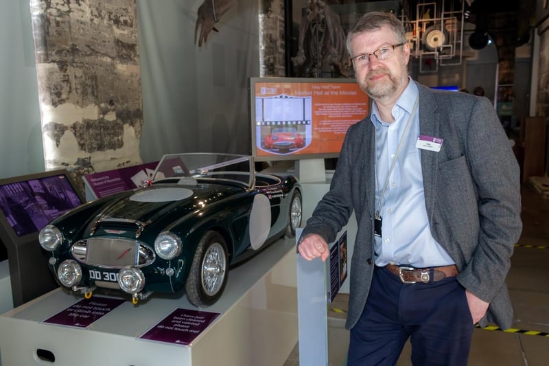 Rob Eyre (Junior Archivist Warwickshire Records Office) at one of the Healey information points inside the museum