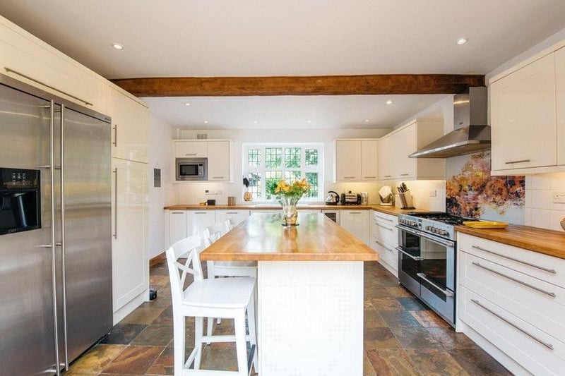 This farmhouse kitchen combines the best of modern living with old school charm