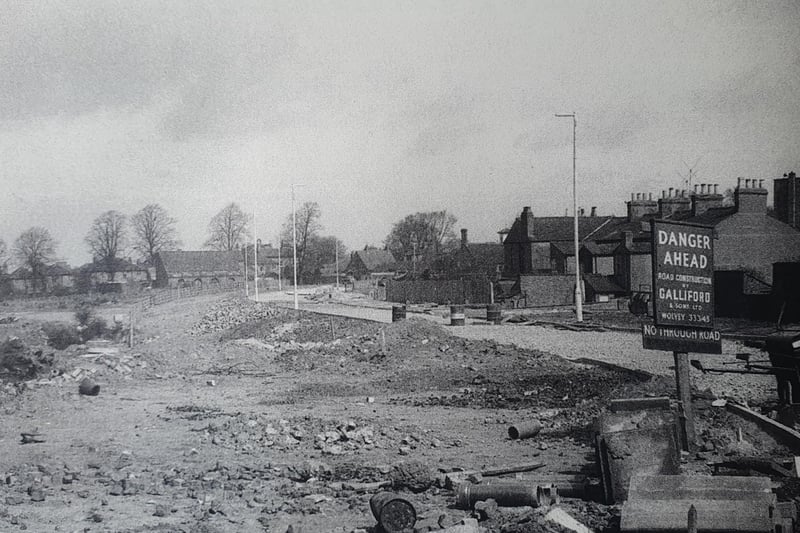 We have put this one up online before - it shows a street under construction. But which one?