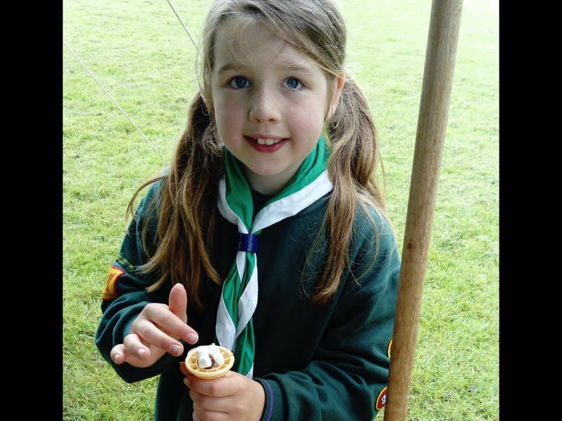 Amelia with her camp fire cone