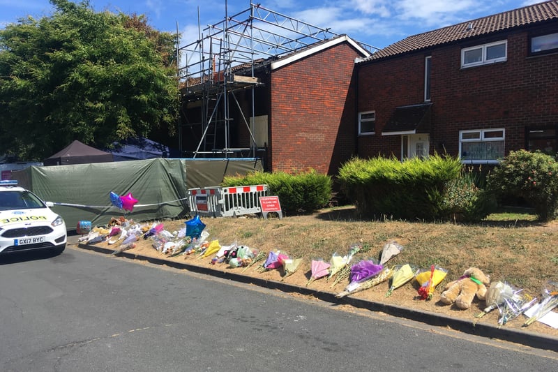 Floral tributes at the scene in Croxden Way.