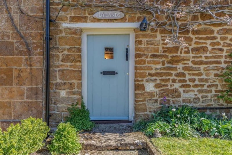 Front door at the Bylands grade II listed Cotswold stone cottage up for sale near Chipping Norton (Image from Rightmove)